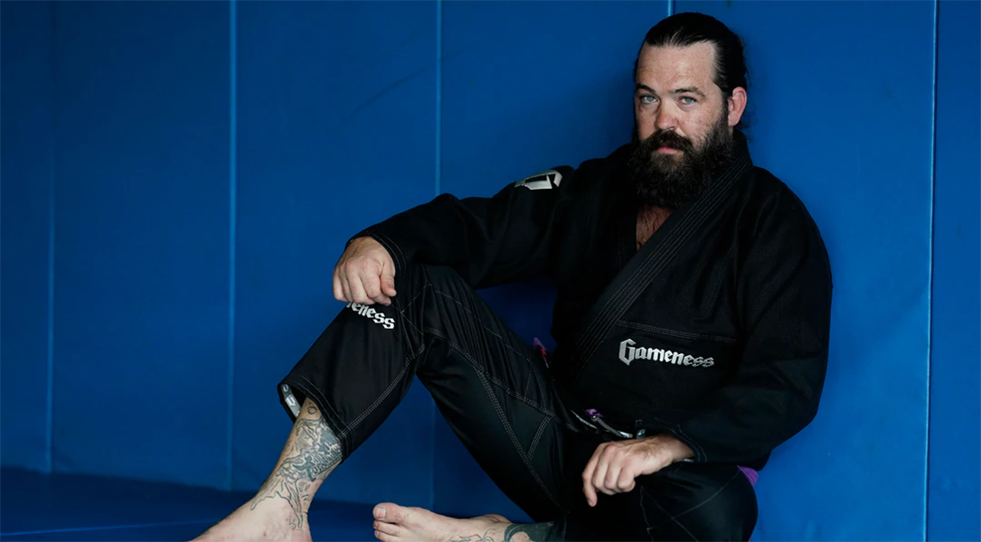 martial artist sitting wearing Gameness BJJ Gi