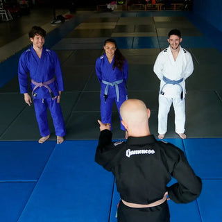 Students and instructor on Gameness mats