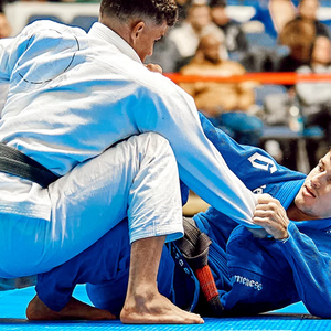 martial artists on mat wearing Gameness BJJ gis