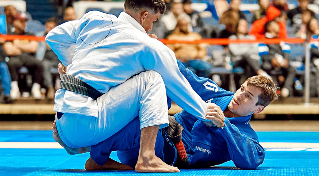 martial artists on mat wearing Gameness BJJ gis