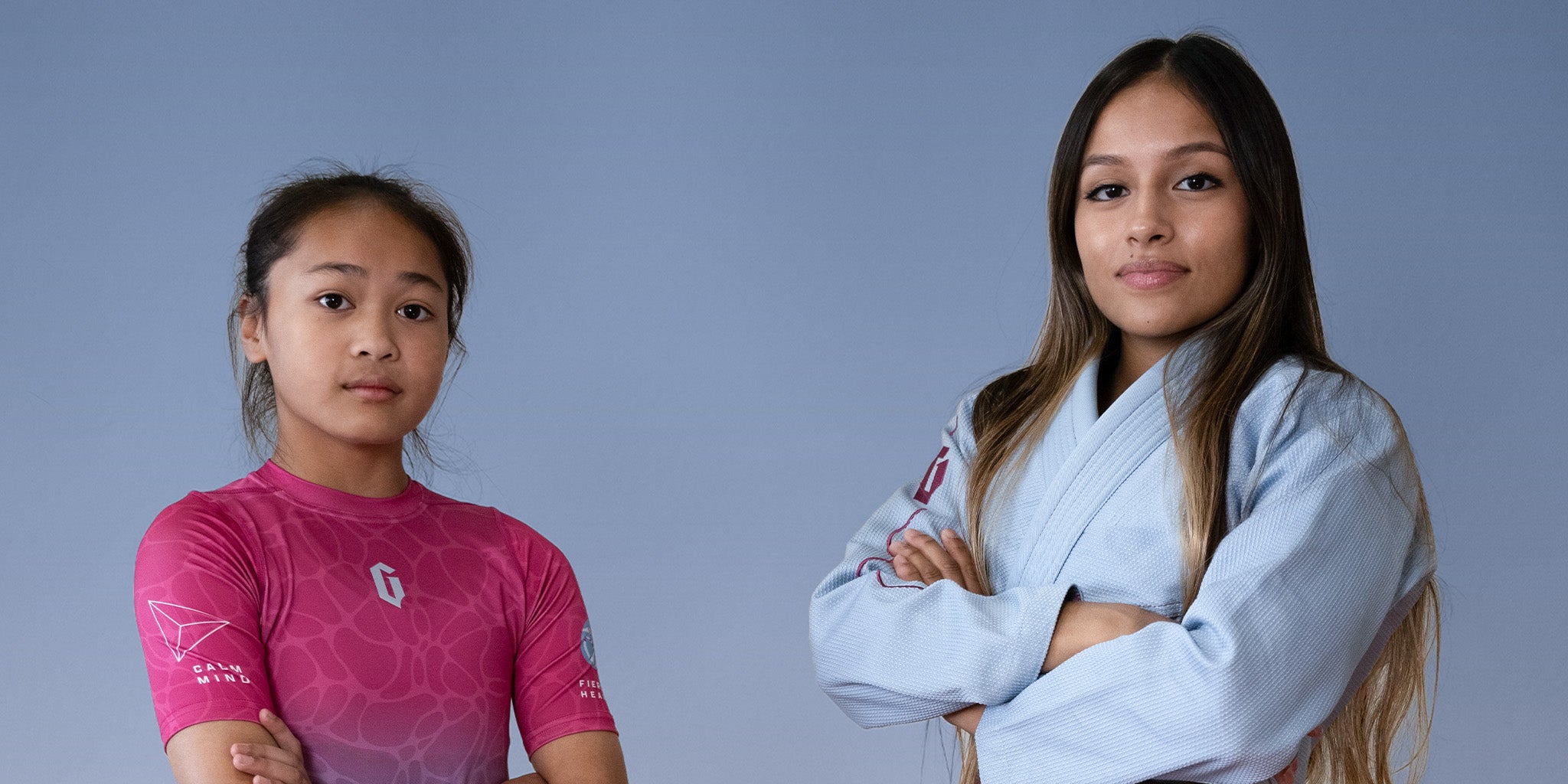 female in tempest gi and another female in tempest rash guard 