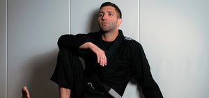martial artist sitting in class
